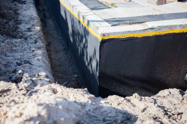 Professional Interior Drainage System technician working in Hebron, KY